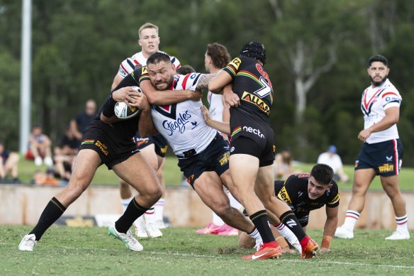 Jared Waerea-Hargreaves smashes into the Panthers’ defensive line.