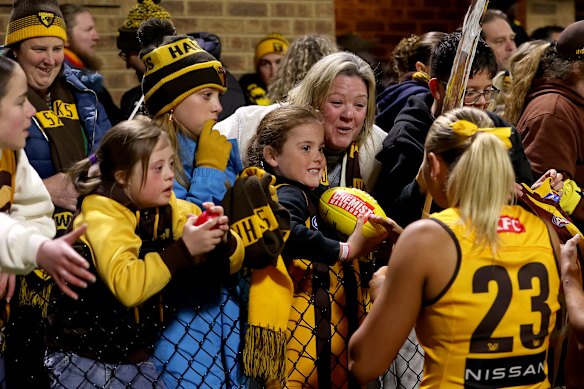 Hawk Jess Vukic means a group of fans at Kinetic Stadium in Frankston.