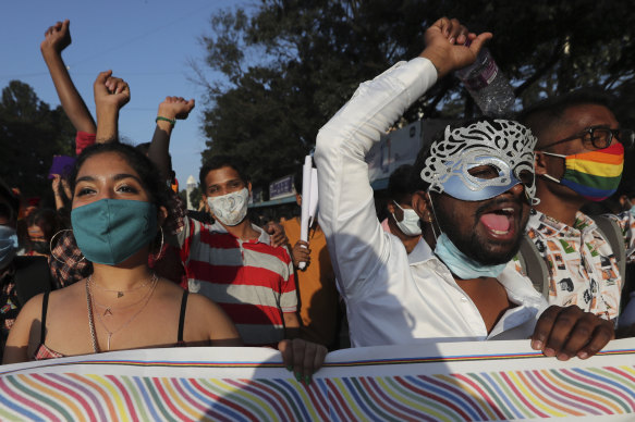 Members of the LGBTQ community and their supporters participate in a parade during Karnataka Queer Habba or festival in Bengaluru, India, last year.