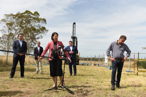 Gladys Berejiklian, then premier, with ministers Stuart Ayres and Andrew Constance announcing the location of airport metro stations in 2020.