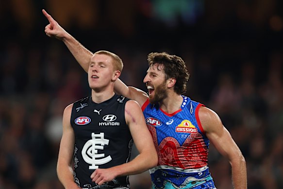 Marcus Bontempelli of the Bulldogs celebrates kicking a goal.