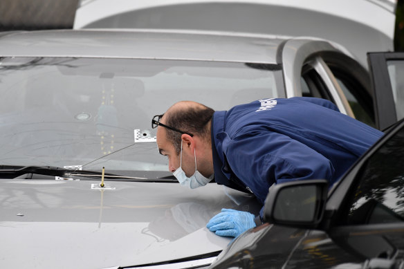 A crime scene investigator at the scene of the shooting outside the Tullamarine McDonald's. 