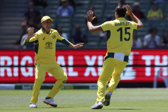 Australia’s Xavier Bartlett, right, celebrates with teammate Marnus Labuschagne.