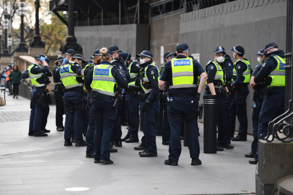 Police gather ahead of the Black Lives Matter protest in Melbourne.