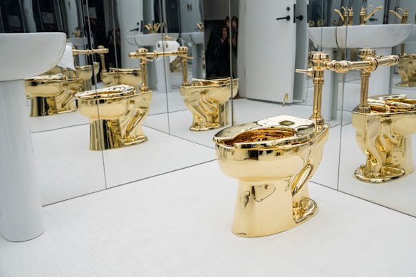 The gold toilet by Maurizio Cattelan.