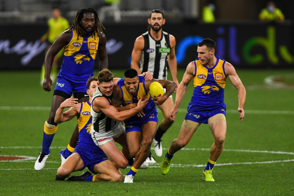 Tim Kelly is caught during the Eagles' loss to Collingwood.