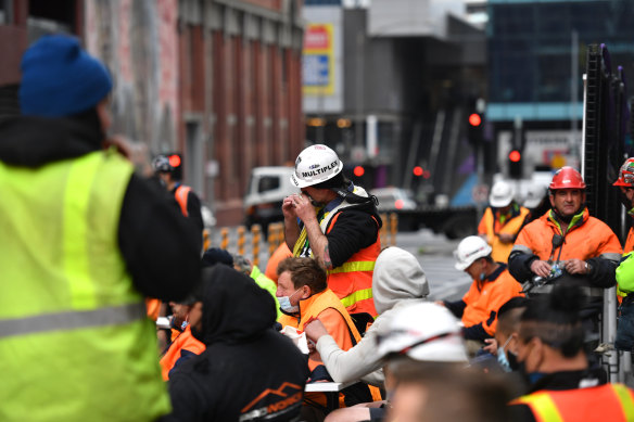 Construction workers blocking Lonsdale Street on Friday.