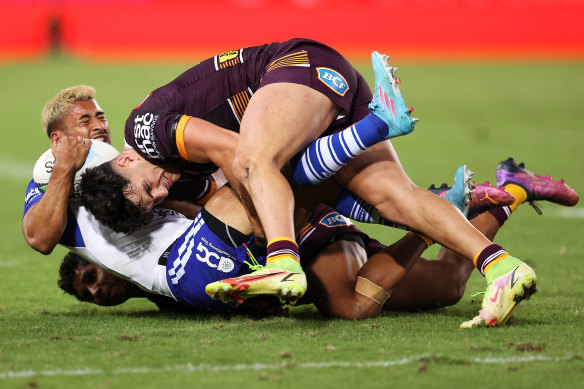 Bailey Biondi-Odo is tackled during the Bulldogs’ round-two loss to the Broncos.