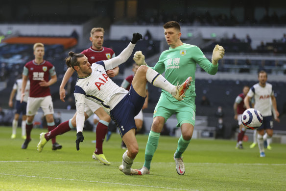 Gareth Bale beats Burnley goalkeeper Nick Pope to score for Spurs.