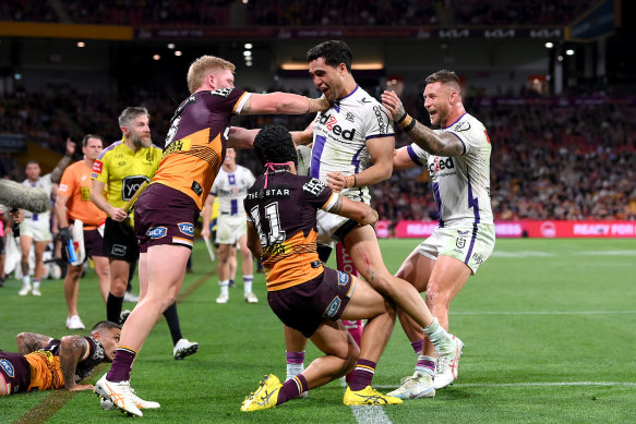 Reimis Smith celebrates a try against Brisbane.