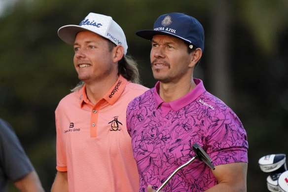 Cameron Smith, left, and actor Mark Wahlberg during the Sony Open tournament pro-am event on Wednesday.