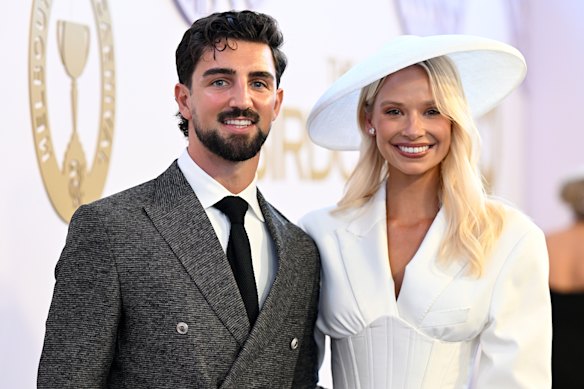 Josh Daicos and Annalise Dalins attend the 2026 Derby Day at Flemington.
