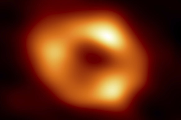 The image of Sagittarius A*, shows the bright ring of matter circling the dark centre where the black hole’s event horizon - the point at which no light can escape - extends.