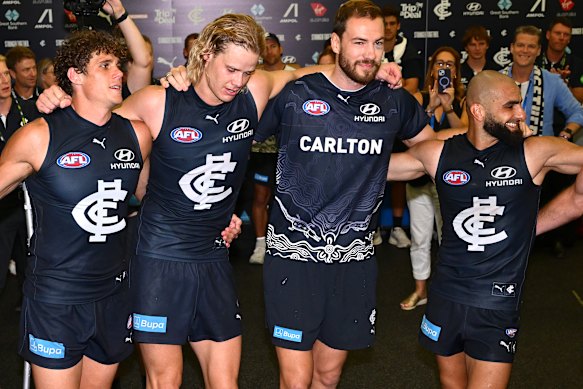 Charlie Curnow, Tom De Koning, Harry McKay and Adam Saad sing the song after the Blues’ thumping win over the Eagles.