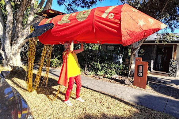 Ready for take-off: Ann Hansen with the “rocket” she “flew” in the 2025 Birdman Rally.