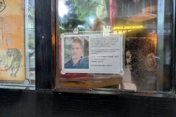 A ramen restaurant in Hong Kong’s Wan Chai neighbourhood displays Samuel Monkivitch’s photo in its window, accusing him of dining and leaving without settling the bill. 