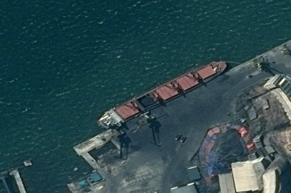 A North Korean cargo ship docked at an unknown port. 