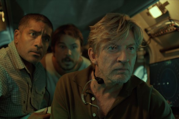 David Wenham has a role as a shadowy Australian researcher.