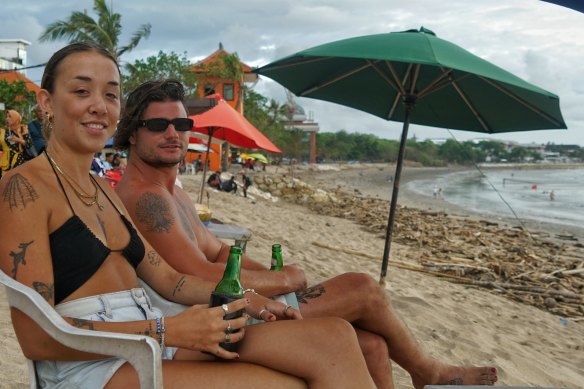 Ella Solomon and Nicholas Magro and Sydney take in Kuta Beach.