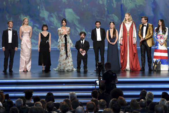 Fashionable gang ... The Game of Thrones cast on stage at the Emmys.