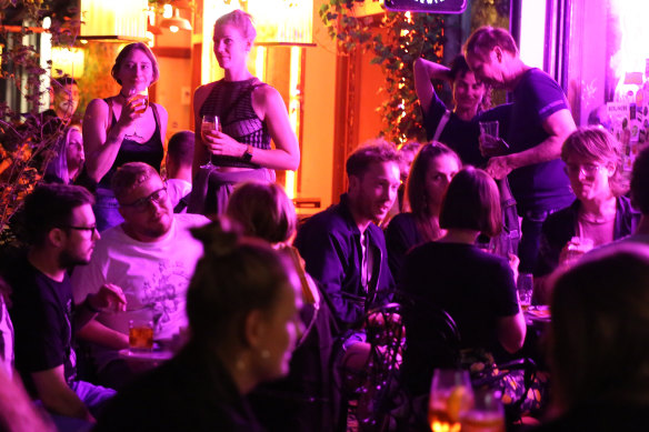 Patrons visit the crowded outdoor terrace of a bar in Berlin, Germany. Nightlife has begun to resume in the city as restrictions on outdoor gatherings have been relaxed, as the ongoing coronavirus pandemic continues.