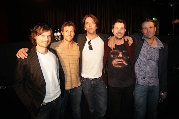Powderfinger during their (previously) final tour in 2010. 