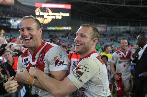 Mark Gasnier celebrates with Ben Hornby after their title triumph in 2010.