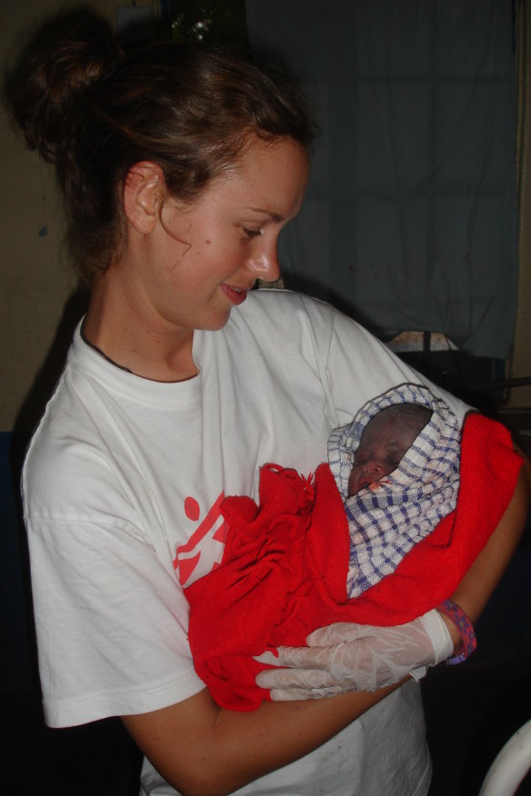Kent with baby Moses in 2007 – her first time assisting at a birth.