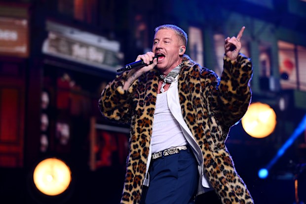 MELBOURNE, AUSTRALIA - MAY 15: Macklemore performs at Rod Laver Arena on May 15, 2024 in Melbourne, Australia. (Photo by Morgan Hancock/Getty Images)