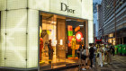 Customers queue to enter a Dior store in Hong Kong’s Tsim Sha Tsui district. 