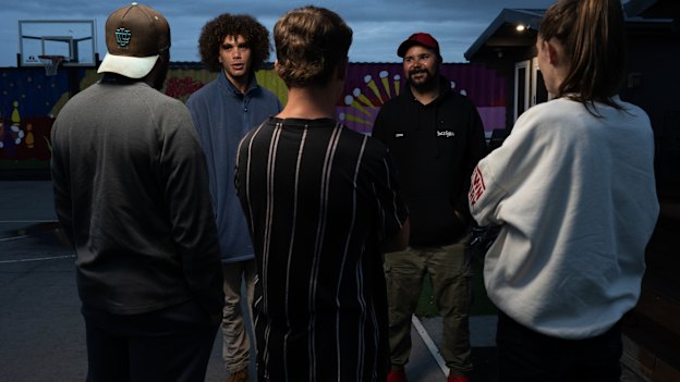 BackTrack Night Crew workers Zac Craig and Steph Olsen talk to young people in Armidale.