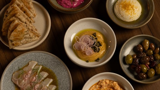 Meze plates include taramosalata dip, green chilli kingfish and tirokafteri.