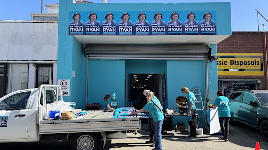 Monique Ryan’s campaign staff and volunteers prepare pre-poll and election-day material. 