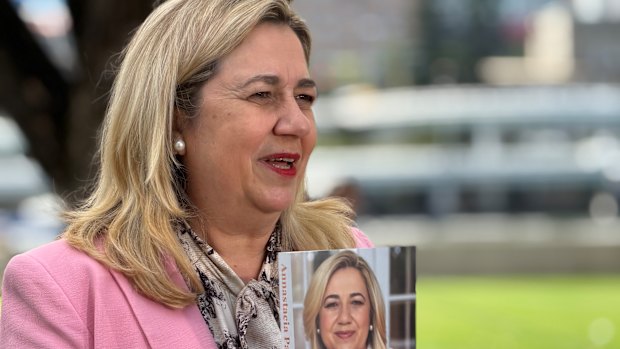 Former Queensland premier Annastacia Palaszczuk with her new book, The Politics of Being Me, at South Bank on Thursday.