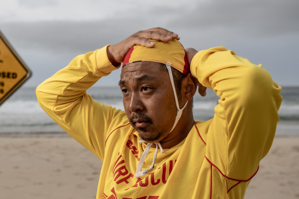 NEWS: Volunteer lifesaver Masaki Shibata at Tamarama beach. He is a linguist and researcher who has written a research paper showing many foreign students - and some domestic students too - don’t understand basic signs at the beach.