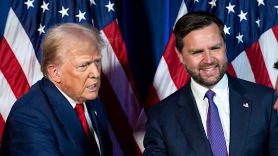 Donald Trump, the Republican presidential nominee, middle left, and Senator J.D. Vance the Republican vice presidential nominee, middle right, shake hands with attendees of a campaign rally in Asheboro, North Carolina.
