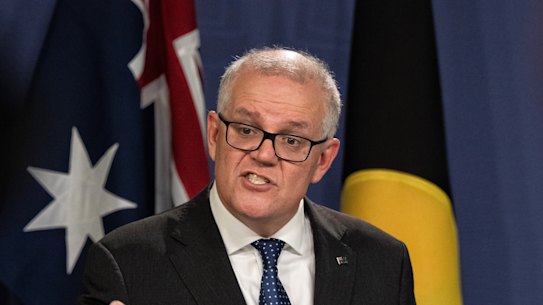 Scott Morrison answers questions from reporters on Augu