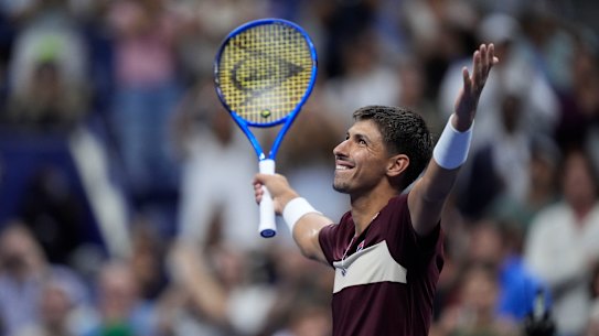 Alexei Popyrin, of Australia, reacts Novak Djokovic, of Serbia,during a third round match of the U.S. Open tennis championships, Friday, Aug. 30, 2024, in New York. (AP Photo/Julia Nikhinson)