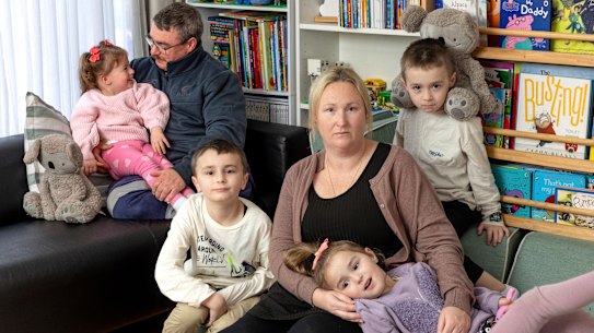 Adam Weeks and Cara Delarue with their four children Ivory, 3, Elijah, 7, Madelyn, 4, and Kohen, 5.