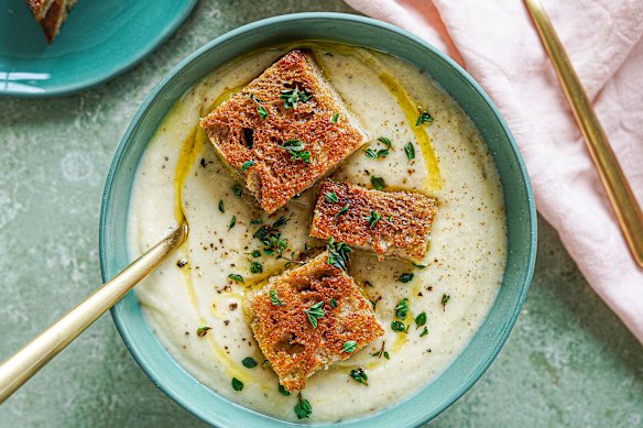 Cauliflower, thyme and potato soup topped with mini cheese toastie bites.