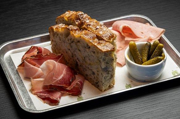 House-baked focaccia is served with dips or charcuterie.