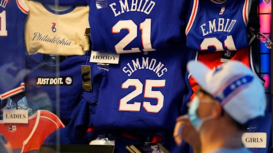 A fan shops for souvenirs in Philadelphia.
