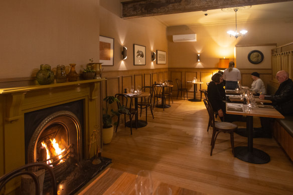 An open fire warms the Courthouse Hotel dining room.