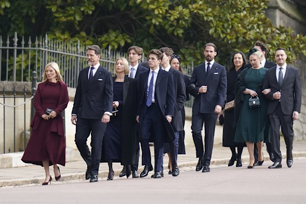 Prince Pavlos, Crown Prince of Greece, Prince of Denmark RE, and Marie-Chantal, Crown Princess of Greece, Princess of Denmark (both front) and Prince Philippos of Greece and Denmark (fifth right) 