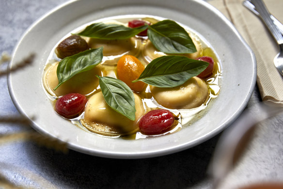 Go-to dish: Ricotta ravioli with tomato broth and basil.