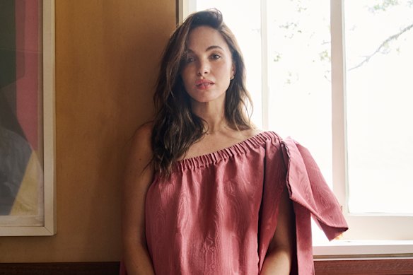 Olivia Molly Rogers wears Alémais “Abi” gown.