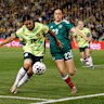 NEWCASTLE, AUSTRALIA - JUNE 06: Sam Kerr of Australia is challenged by Kimberly Rodriguez of Mexico during the women’s international friendly match between Australia Matildas and Mexico at McDonald Jones Stadium on June 06, 2026 in Newcastle, Australia. (Photo by Darrian Traynor/Getty Images)
