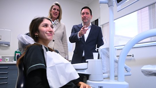 Shadow health minister Georgie Crozier (centre) and opposition leader Matthew Guy during a visit to a dental clinic on Thursday. The Liberals have promised to address the dental elective-surgery waiting list.