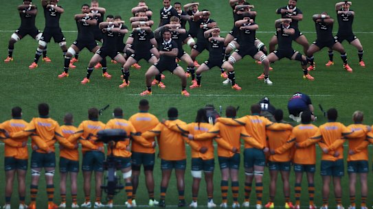 The Wallabies stare down the All Blacks’ haka.