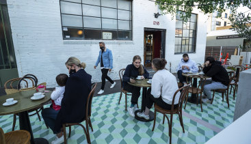 People embracing outdoor dining at St Ali in South Melbourne in October.